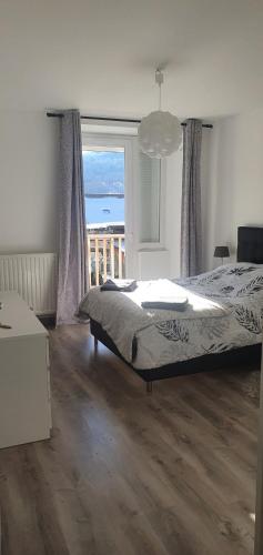 Ένα ή περισσότερα κρεβάτια σε δωμάτιο στο Lamour