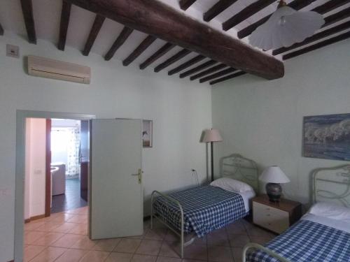 Posteľ alebo postele v izbe v ubytovaní Residence B&B il Connubio