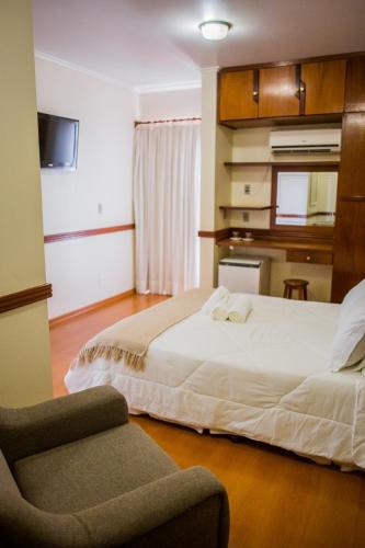 Katil atau katil-katil dalam bilik di Hotel Marques