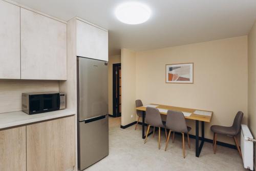 Dapur atau dapur kecil di VIP Flat lavina проспект М Лушпи 2 корп2