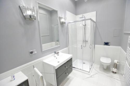 Kúpeľňa v ubytovaní Apartament Kryształowy AC Progres