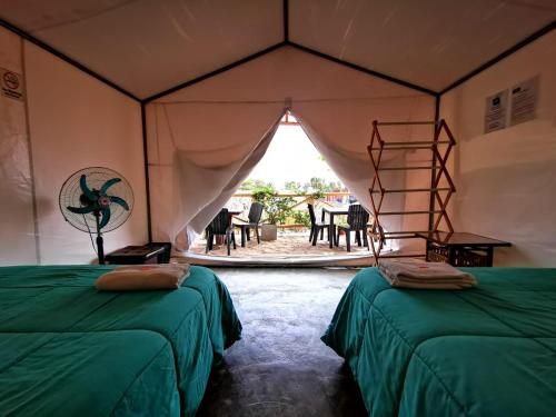 Cama ou camas em um quarto em Ecocamp Huacachina