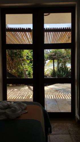 Κήπος έξω από το Cabôco Sonhadô Passeios Náuticos e Pousada