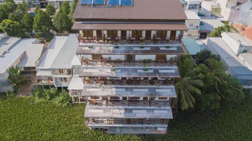 an overhead view of a building with balconies at Little Saigon Hotel in Chau Doc
