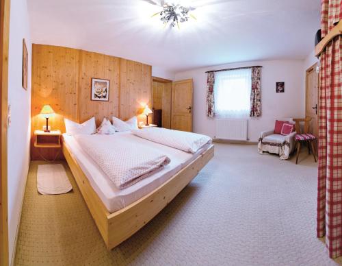 Postel nebo postele na pokoji v ubytování Gasthof Pension Lanzenhof