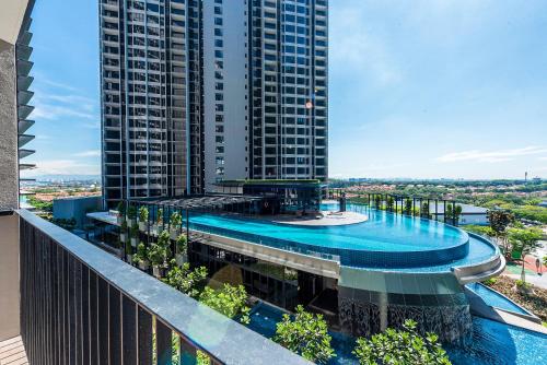 a building with a swimming pool on top of it at Time To Relax v 3BR Geo Bukit Rimau,Shah Alam by Verano in Shah Alam