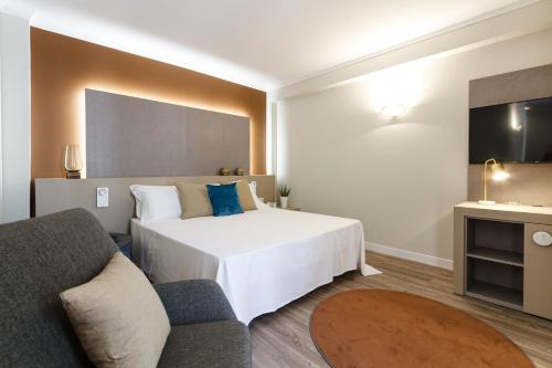 Una cama o camas en una habitación de Seawater Hotel Bio & Beauty Spa