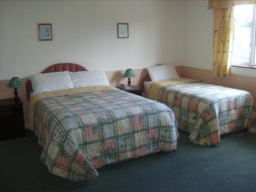 
A bed or beds in a room at Westfield House
