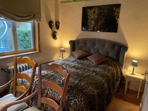 Кровать или кровати в номере B&B de Meidoorn