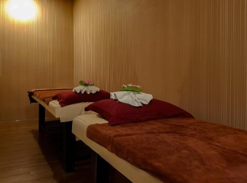 Ένα ή περισσότερα κρεβάτια σε δωμάτιο στο Song Tien Hotel