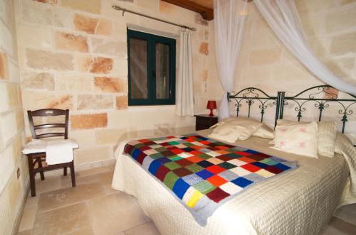 Posteľ alebo postele v izbe v ubytovaní Relais Villa Lucia