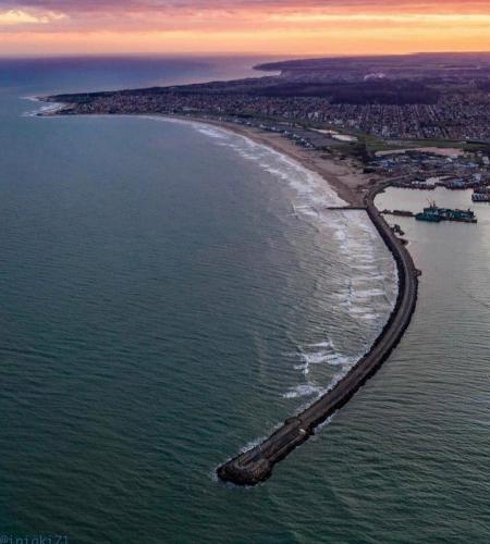 an aerial view of a beach in the ocean at Hotel Artico in Mar del Plata