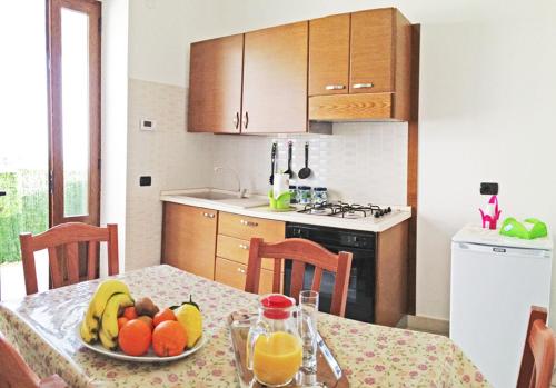 Dapur atau dapur kecil di Holidays Costanza