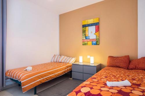A bed or beds in a room at Candelaria Relax