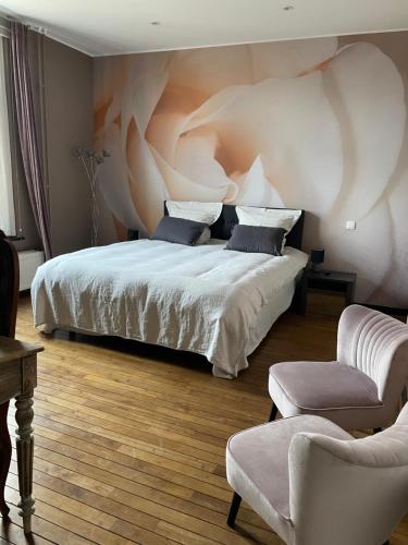 Een bed of bedden in een kamer bij B&B Het Doctershoes