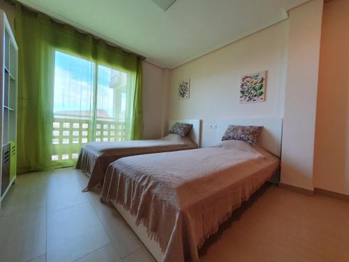 Posteľ alebo postele v izbe v ubytovaní Okeanos fantastic 2 bedrooms VR-PN