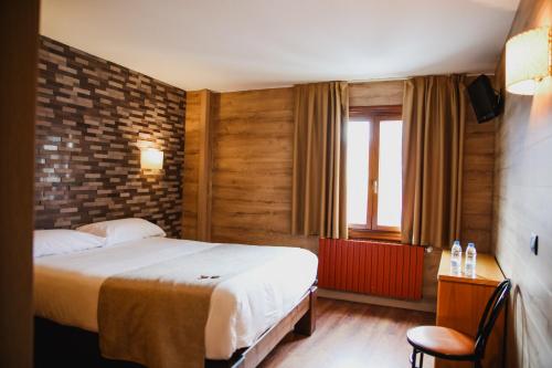 Cama o camas de una habitación en Cal Ruiz