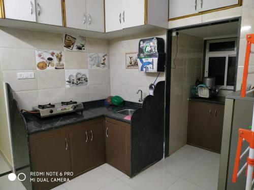 Kuchyň nebo kuchyňský kout v ubytování Mayuri cottage