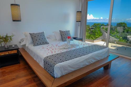 Giường trong phòng chung tại JADE DUPLEX