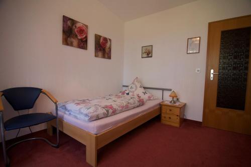 Postel nebo postele na pokoji v ubytování Hotel Pension Fernblick