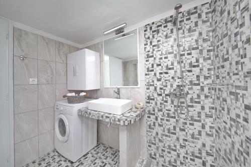 Kúpeľňa v ubytovaní Molos House