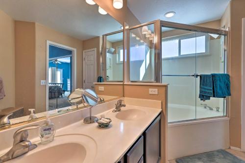 a bathroom with a sink and a mirror at Resort-Style Gem with Pool Access 10 Mi to Dtwn PHX in Phoenix