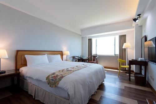 Cama o camas de una habitación en Ola Hotel