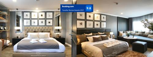 a bedroom with two beds and a sign that reads at Stay in Style at Nimman R306AB in Chiang Mai