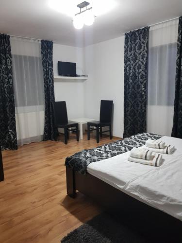 Ένα ή περισσότερα κρεβάτια σε δωμάτιο στο Casa Mara