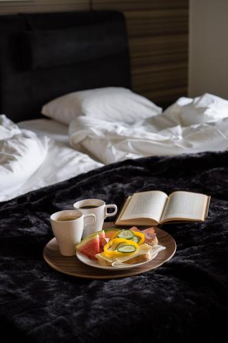 Ein Bett oder Betten in einem Zimmer der Unterkunft Fagersta Wärdshuset C. Dickens