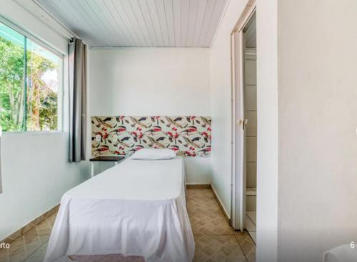 Postel nebo postele na pokoji v ubytování Hotel Nosso Bosque