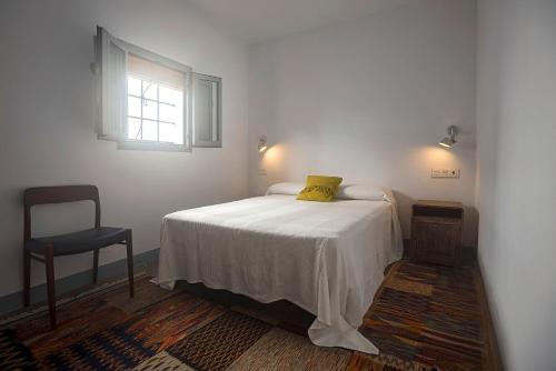 Postel nebo postele na pokoji v ubytování Casa Santo Cristo - Califa Casas Vejer