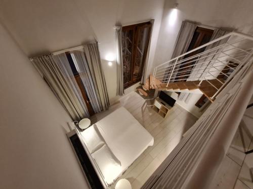 an overhead view of a staircase in a house at B&B Locanda de' Colli in Signa
