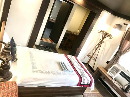 a room with a book sitting on a bed at Shiva Guest House in Bhaktapur