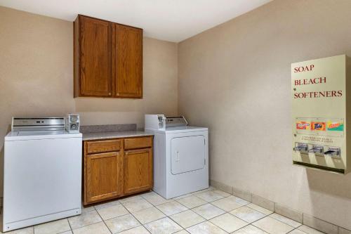 a kitchen with a white refrigerator and a dishwasher at Comfort Inn & Suites Texas Hill Country in Boerne
