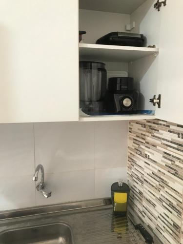 Dapur atau dapur kecil di Chalés da Poliana