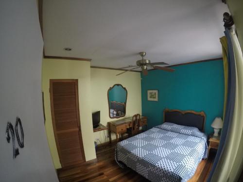 Ένα ή περισσότερα κρεβάτια σε δωμάτιο στο La Bergerac Boutique Hotel