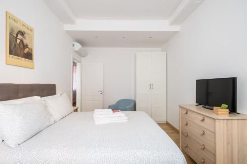 Katil atau katil-katil dalam bilik di Canonica Suites