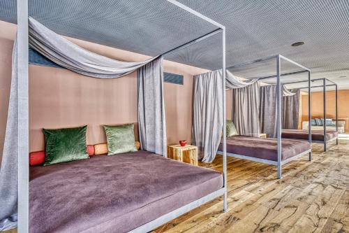 Postel nebo postele na pokoji v ubytování Hotel Pustertalerhof