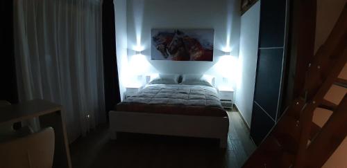 Ένα ή περισσότερα κρεβάτια σε δωμάτιο στο B&B il Fienile del Borgo