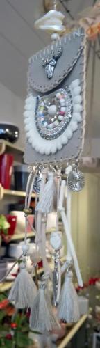 a chandelier with silver and white decorations on it at Les Terrasses de Saillans in Saillans