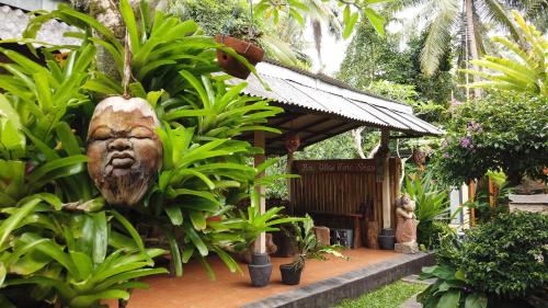 Κήπος έξω από το Putu home stay ubud