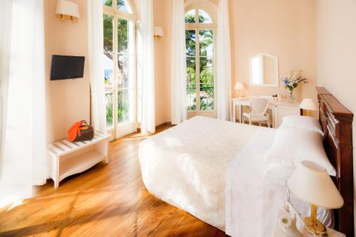 Postel nebo postele na pokoji v ubytování Villa Sylva & Spa