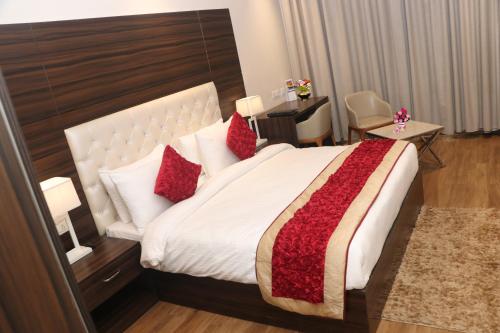 Postel nebo postele na pokoji v ubytování Comfort Inn Lakhimpur