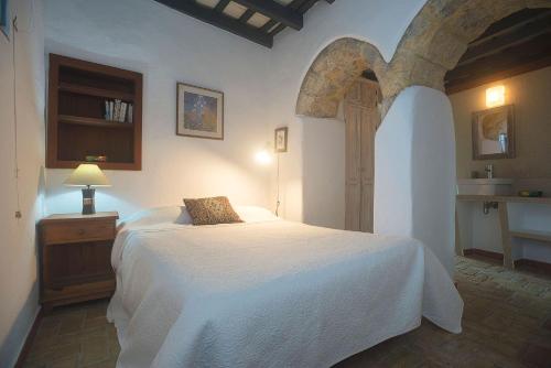 Posteľ alebo postele v izbe v ubytovaní Casa Badillo - Califa Casas Vejer