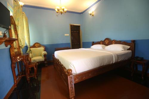 Postel nebo postele na pokoji v ubytování Hill Fort Hotel And Resorts Yelagiri Hills