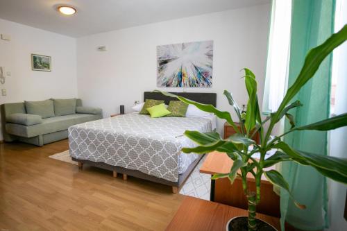 מיטה או מיטות בחדר ב-Villa Confort Exclusive
