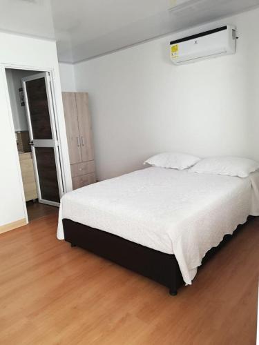 Postel nebo postele na pokoji v ubytování Hotel Molino de Viento