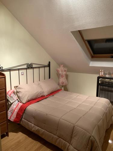 Giường trong phòng chung tại Atico de lujo en Tomelloso Hoster Verona