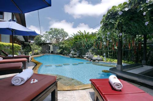 Bazén v ubytování Yulia Village Inn Ubud nebo v jeho okolí